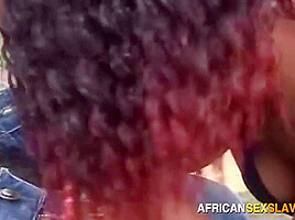 African slut banged doggystyle against car