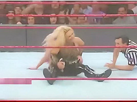 Alexa Bliss Squeezes Natalya With Bodyscissors