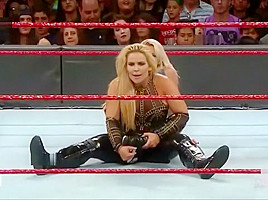 Alexa Bliss Squeezes Natalya With Bodyscissors