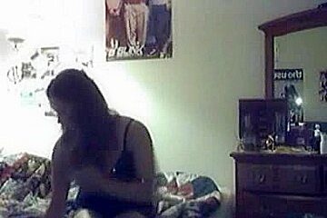 Amateur babe with big boobs dresses up in front of the webcam