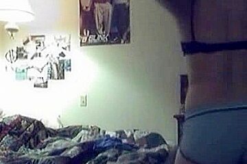 Amateur babe with big boobs dresses up in front of the webcam
