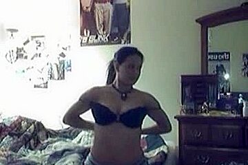 Amateur babe with big boobs dresses up in front of the webcam