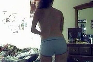Amateur babe with big boobs dresses up in front of the webcam