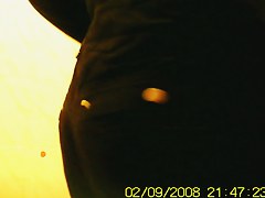 Amateur flashed bushy pussy while pissing on toilet