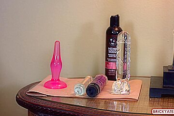 Aroused blonde is using sex toys in a massage room and moaning during an intense orgasm