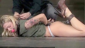 BDSM submissive gagged and hogtied