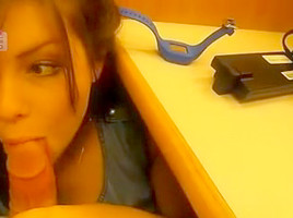 Beneath the desk cubicle getting a facial
