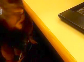 Beneath the desk cubicle getting a facial