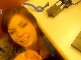 Beneath the desk cubicle getting a facial
