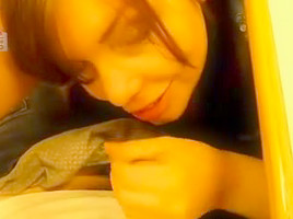 Beneath the desk cubicle getting a facial