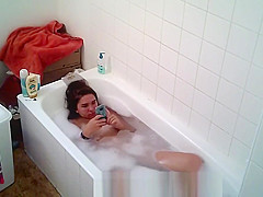 Big tittied college slut Aylie takes a bath
