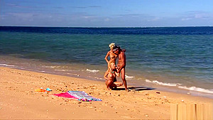 Blonde girls get fucked on the beach