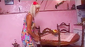 Blonde granny gets fucked on the table