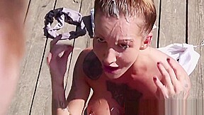 Busty femdom tugging guy outdoors for spunk