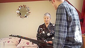 Butch Pussy Caned in Rigid Metal Bondage