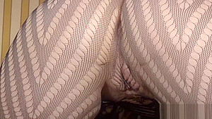 Cute slut rubs her legs in pantyhose