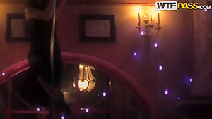 Dark haired babe Natasha does a nice pole dancing act