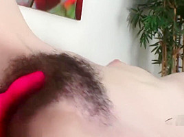 Emma Evins using a pink dildo