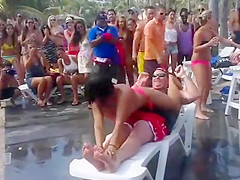 Fat guy gets a wild lap dance from topless girl