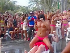 Fat guy gets a wild lap dance from topless girl