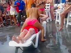 Fat guy gets a wild lap dance from topless girl