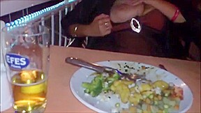 Footjob and titsflash in public restaurent