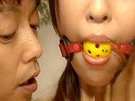 Gagged Japanese Babe Surrenders Her Succulent Love Tunnel