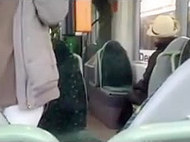 German babe gives a blowjob in a public bus