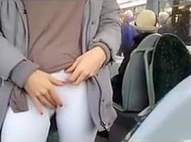 German babe gives a blowjob in a public bus