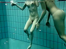 Girls Swimming Underwater And Enjoying Eachother