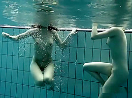 Girls Swimming Underwater And Enjoying Eachother