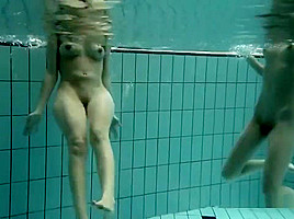Girls Swimming Underwater And Enjoying Eachother
