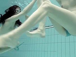 Girls Swimming Underwater And Enjoying Eachother