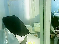 Gynecologist exam spied through window