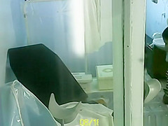 Gynecologist exam spied through window