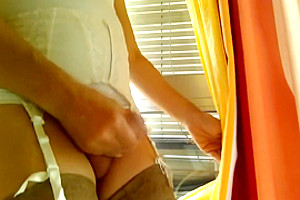 Handsfree crossdresser in white lingerie