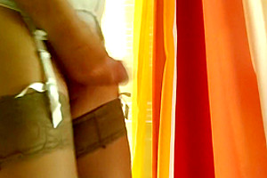 Handsfree crossdresser in white lingerie