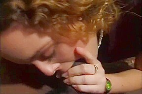 Hot Redhead sucks a big black dick until he cums on her mouth and face