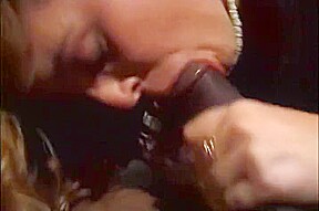 Hot Redhead sucks a big black dick until he cums on her mouth and face