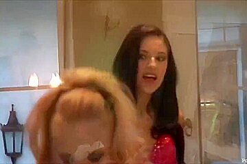 Hot blonde is squeezing her boobs while her partner is ejaculating all over her skin