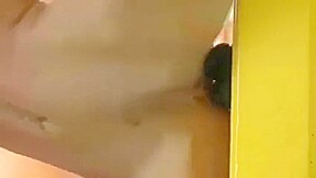 Hot flexible babe in swimsuit fucks dildo on door knob