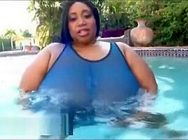 Huge Busty Black BBW OIls Up Her 46M Sized Tits