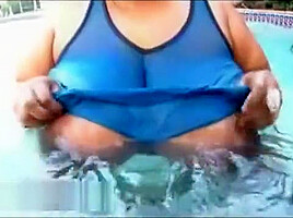 Huge Busty Black BBW OIls Up Her 46M Sized Tits
