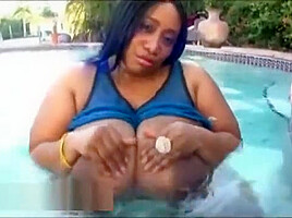 Huge Busty Black BBW OIls Up Her 46M Sized Tits