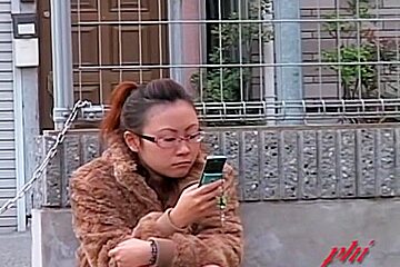 Japanese babe caught on cam during a kinky street sharking