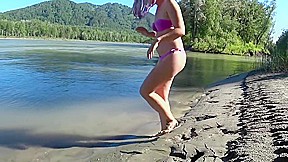 Lesbians outdoors  Girlfriend by the river fuck doggystyle 