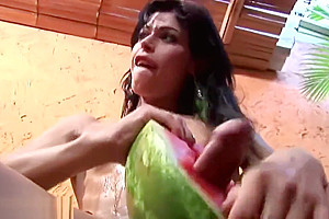 Lovely shemale pounds a watermelon so hard that she cumshots
