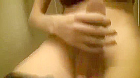 Mariana Cordoba cumming in a public restroom