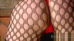 Masturbation brunette mistress in latex gloves and black leather boots
