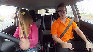Natural busty babe bangs in driving school car